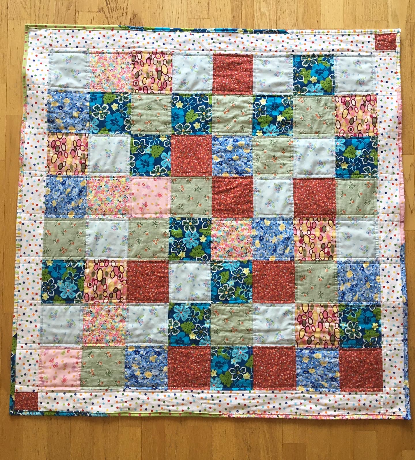 multicolored square quilt