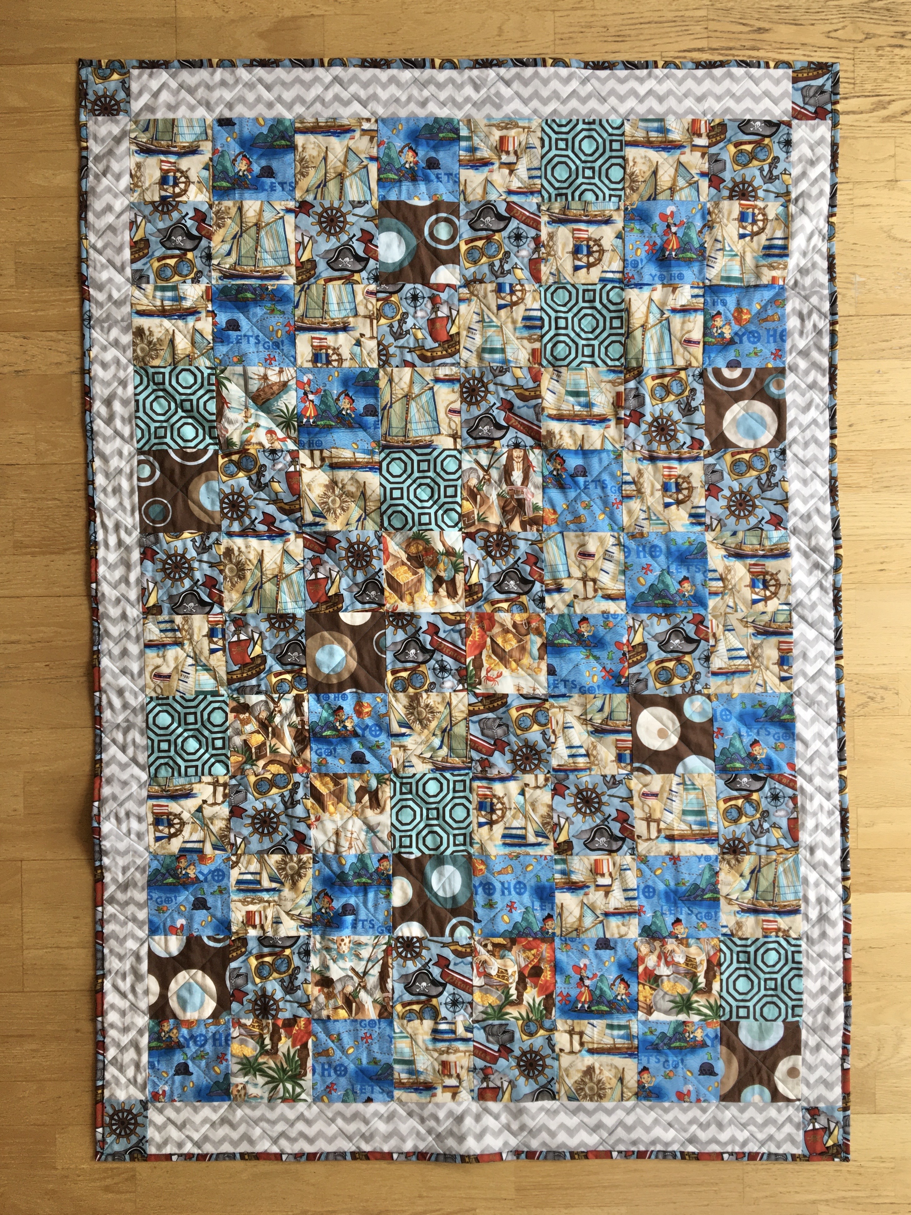 blue themed quilt with pirate fabric